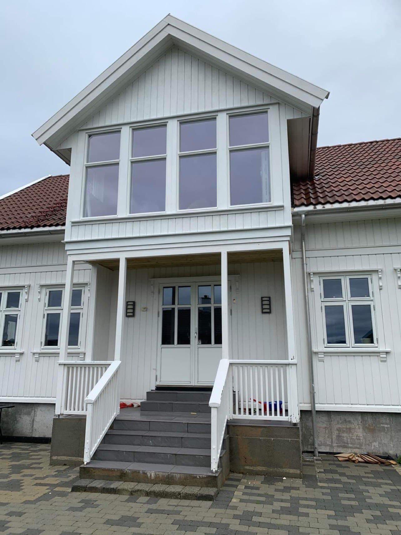 White house with large front windows