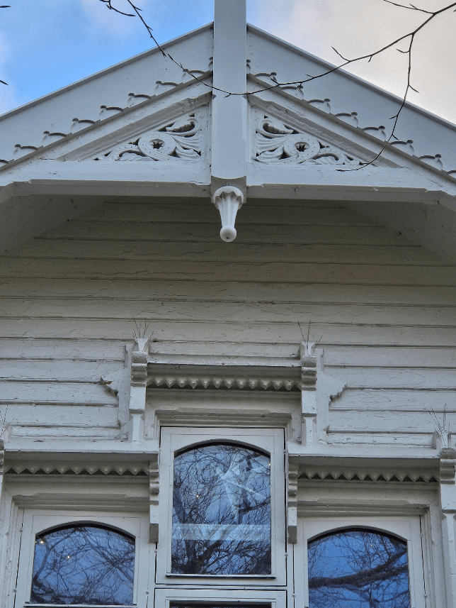 Ornate white wooden house details