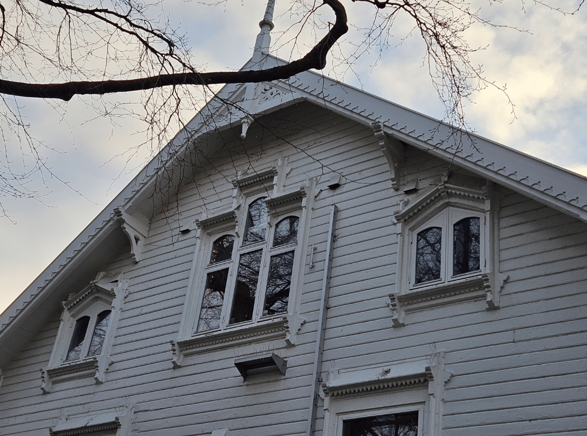 White wooden house with ornate details