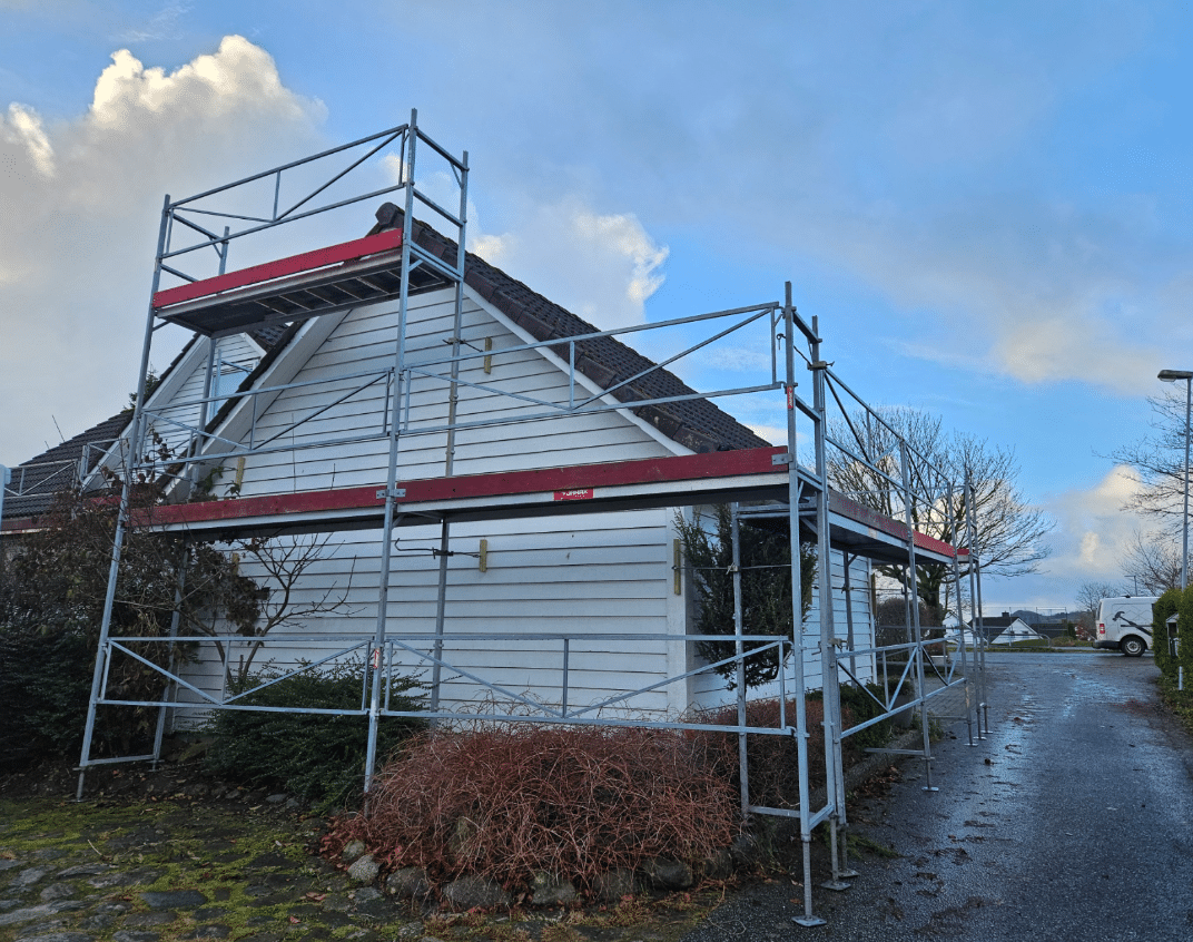 House under construction with scaffolding.