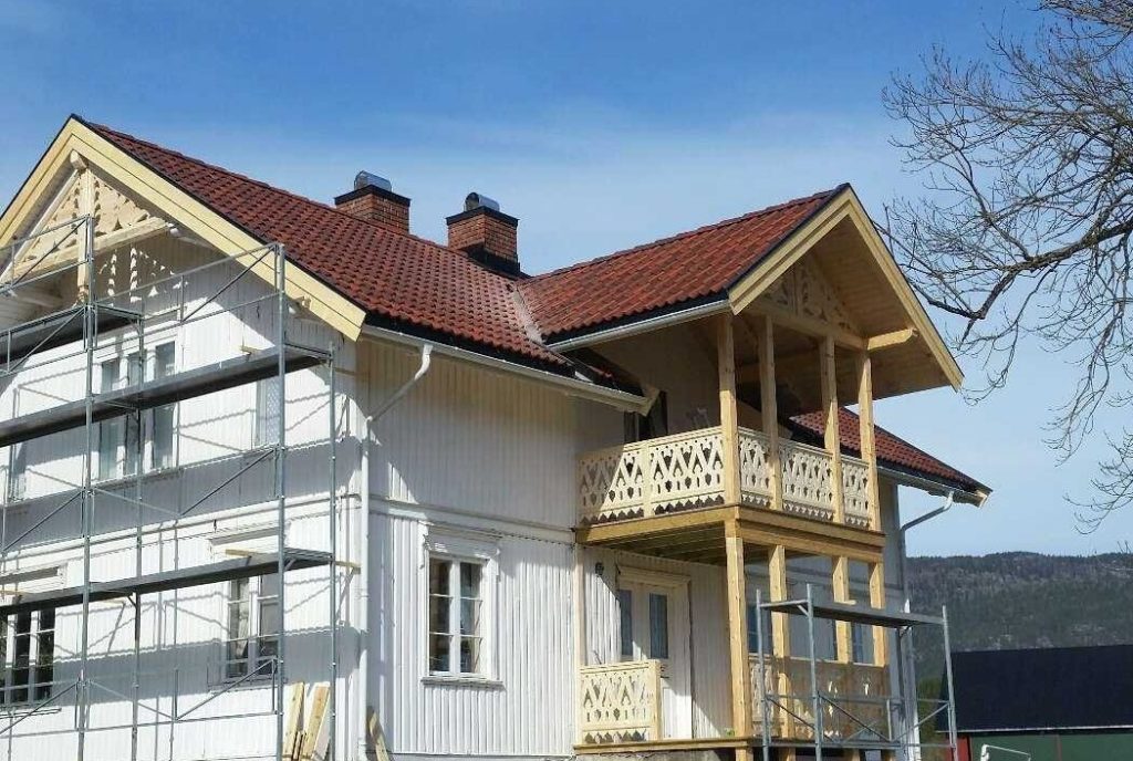 Renovated house with wooden balcony